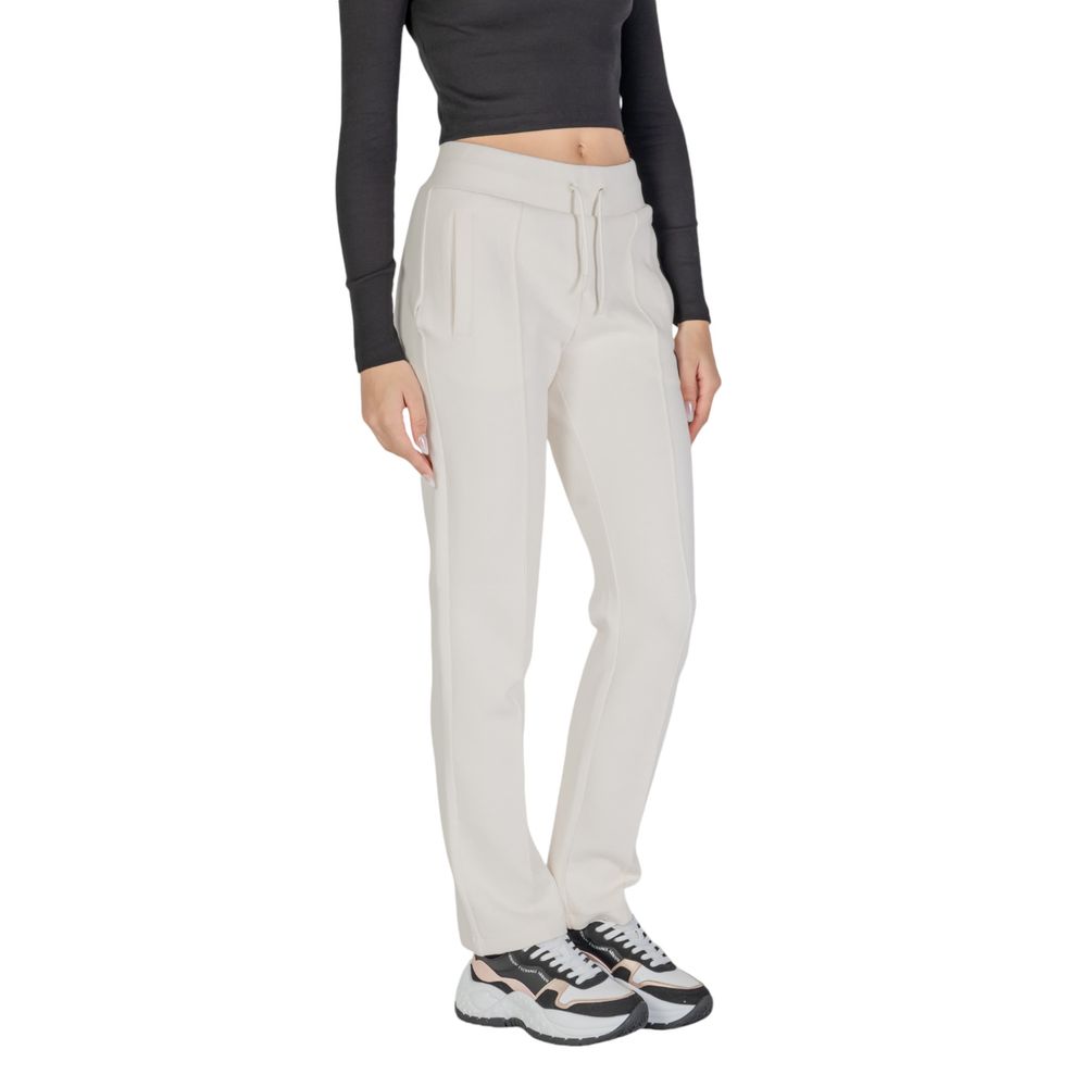 Pantaloni sport Guess Active din bumbac crem
