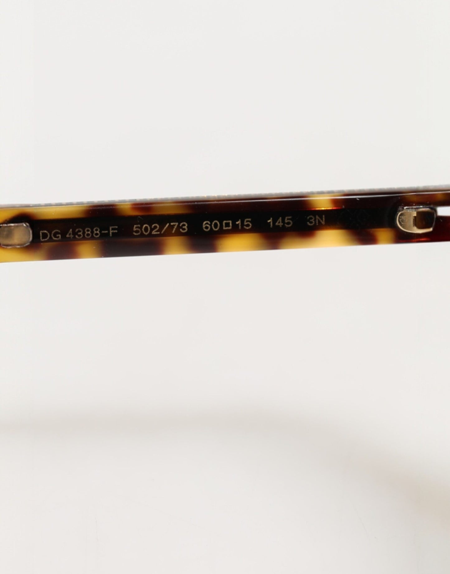 Ochelari de soare Dolce & Gabbana maro închis cu ramă tip carapace de broască țestoasă