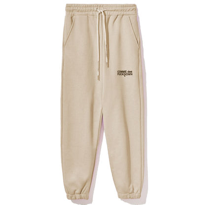 Pantaloni de trening bej din bumbac Comme Des Fuckdown pentru femei
